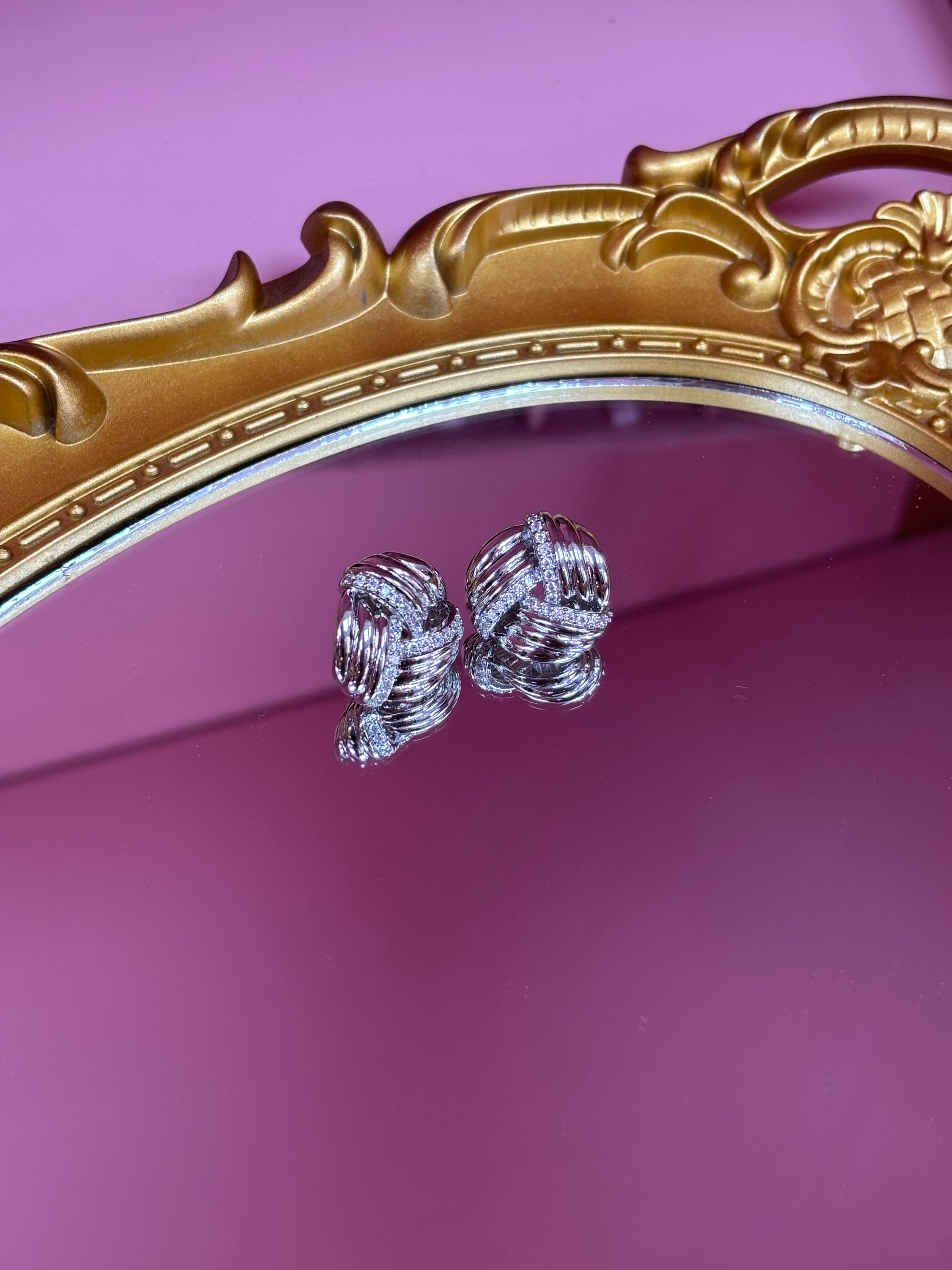 Orecchini luce intrecciata