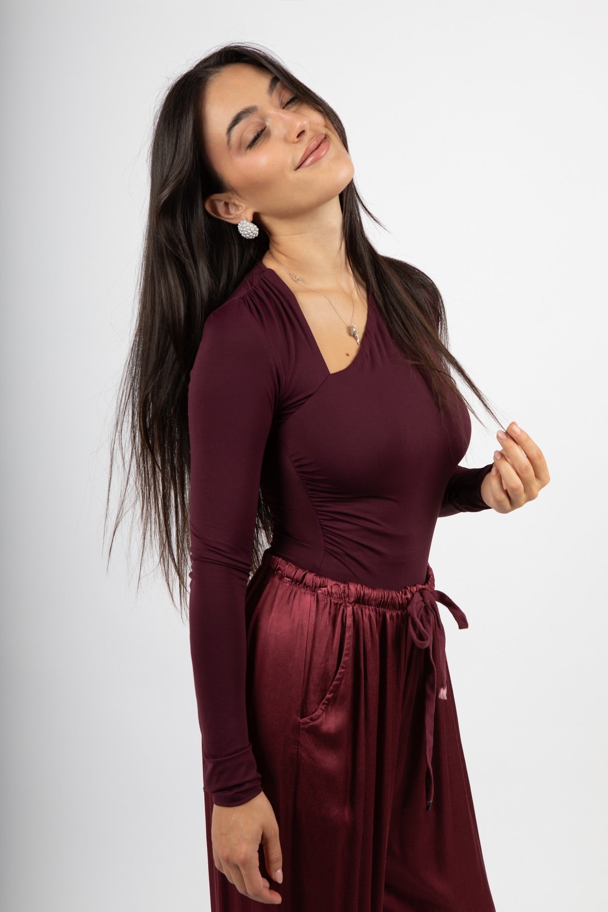 Body aderente con drappeggio